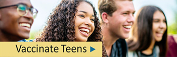 Group of teenagers smiling and looking into the distance